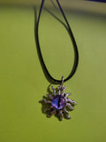 Sunwatcher™ — Purple Eye Sun Pendant