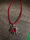 Sunwatcher™ — Crimson Eye Sun Pendant