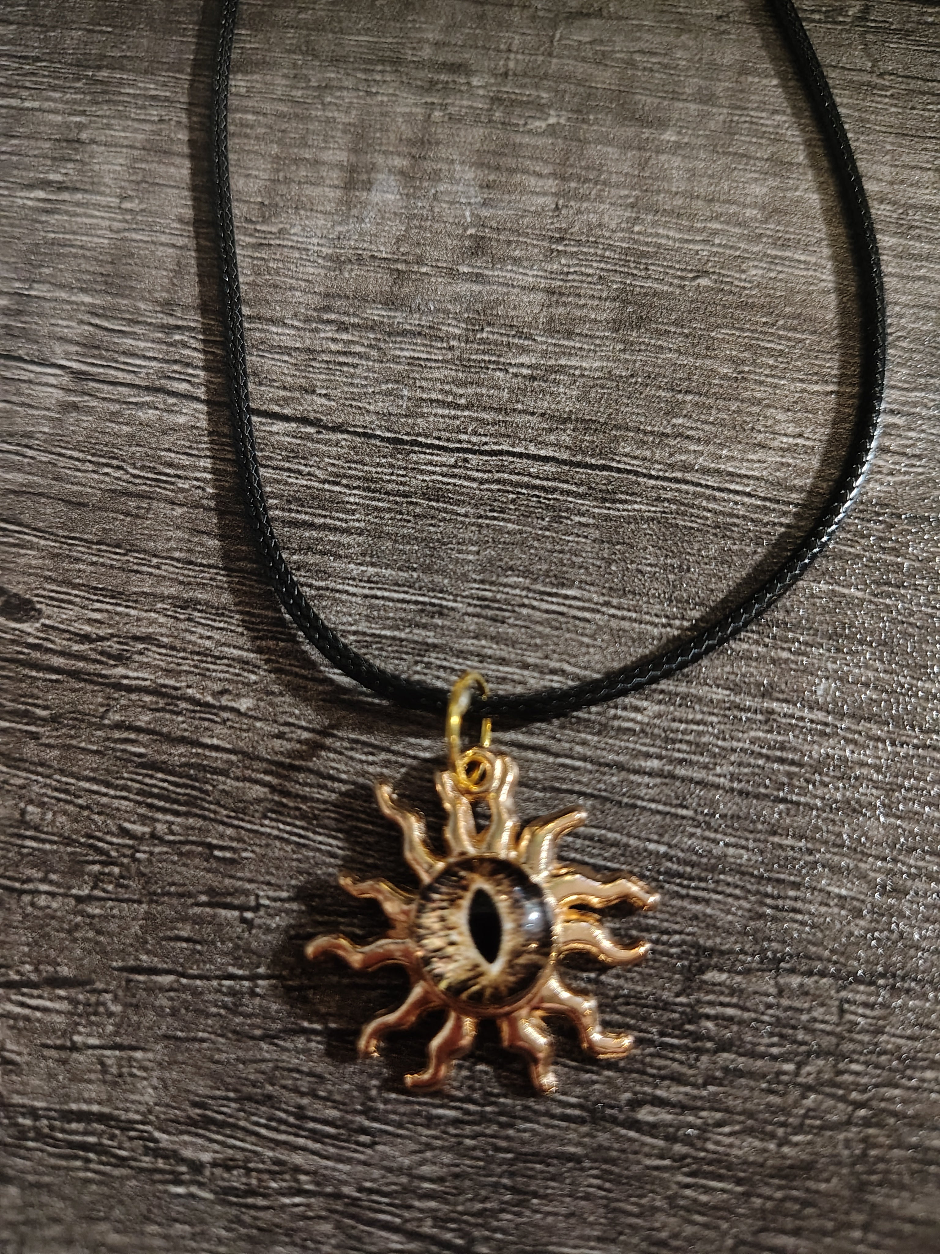 Sunwatcher™ — Void Eye Sun Pendant