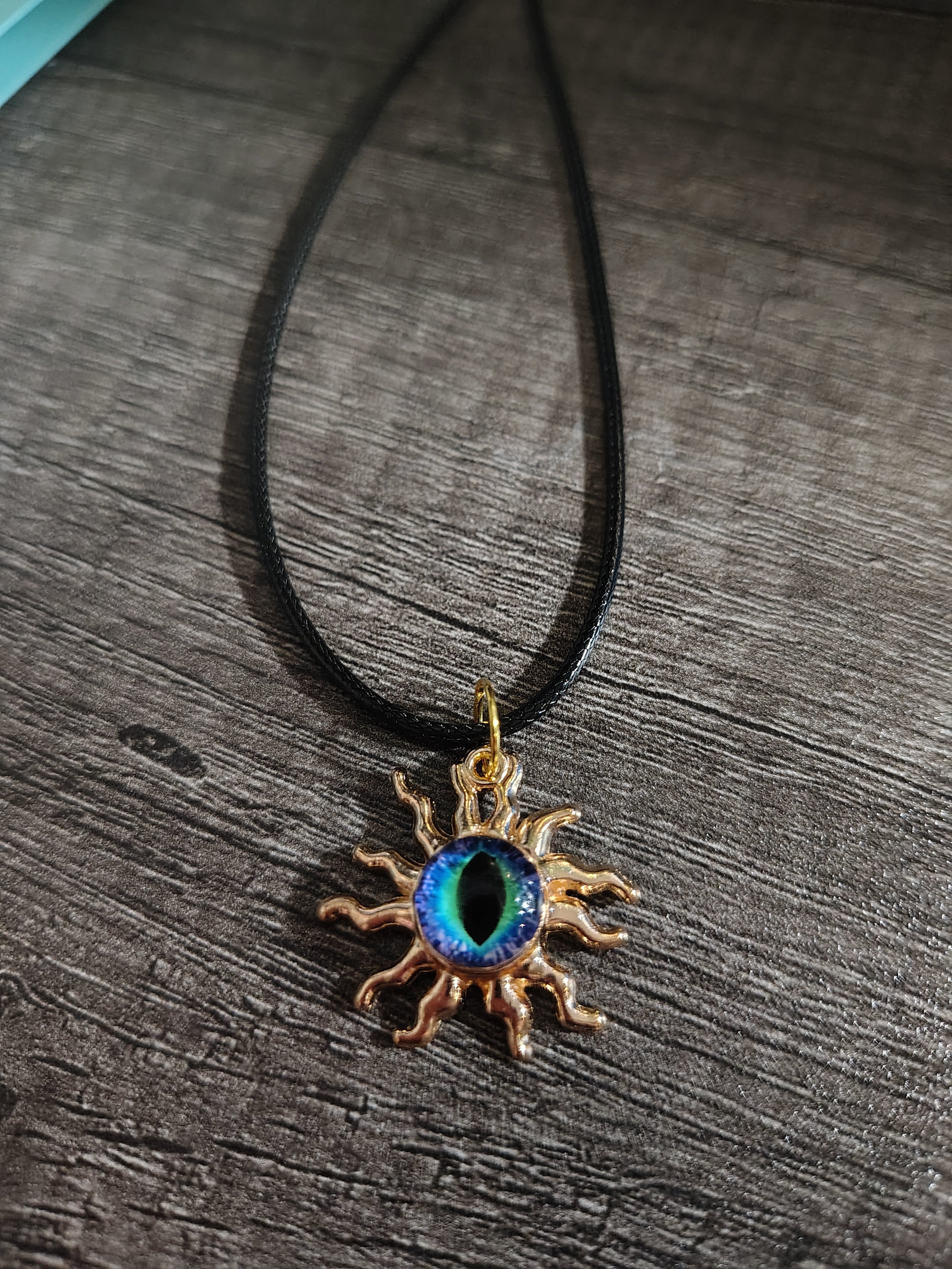 Sunwatcher™ — Iridescent Ocean Eye Sun Pendant