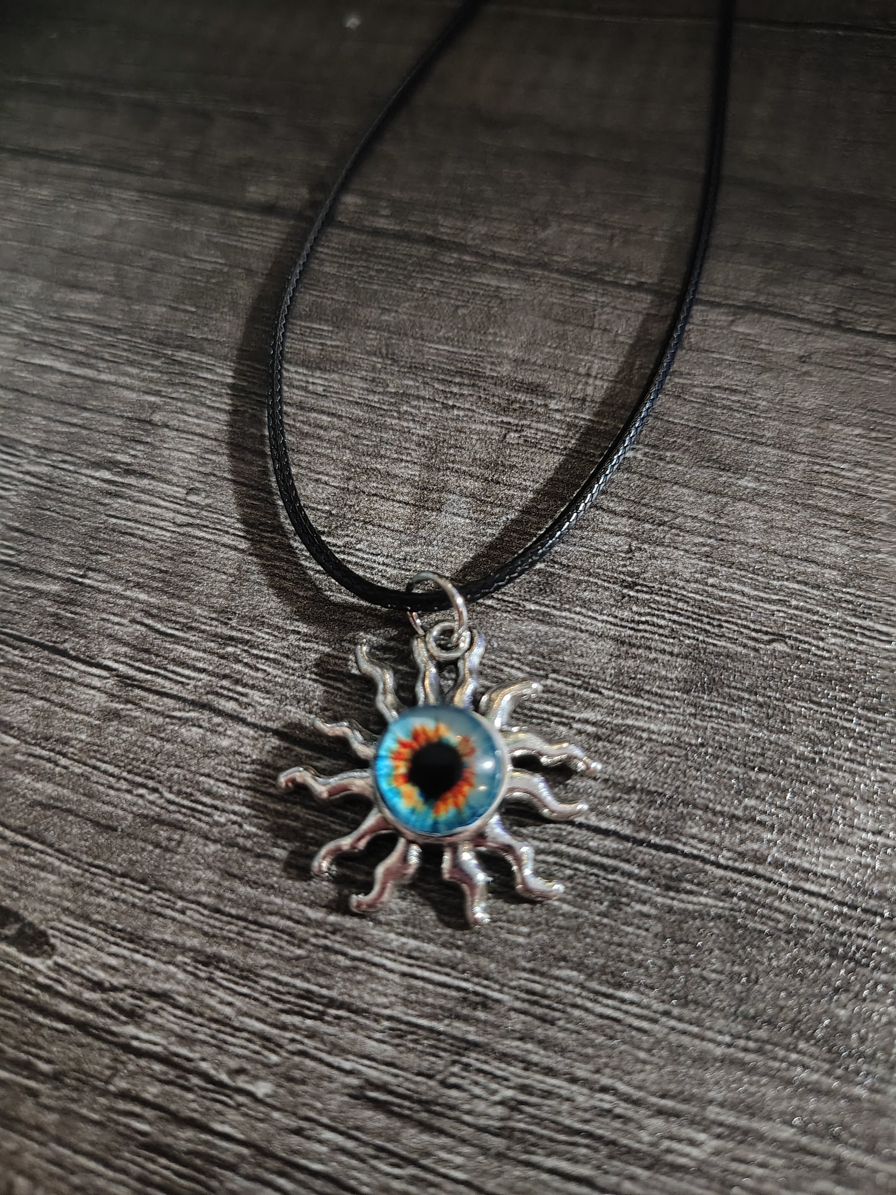 Sunwatcher™ — Cosmic Burst Eye Sun Pendant