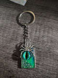 Veilwatcher™ — Emerald Spider Eye Glow Keychain