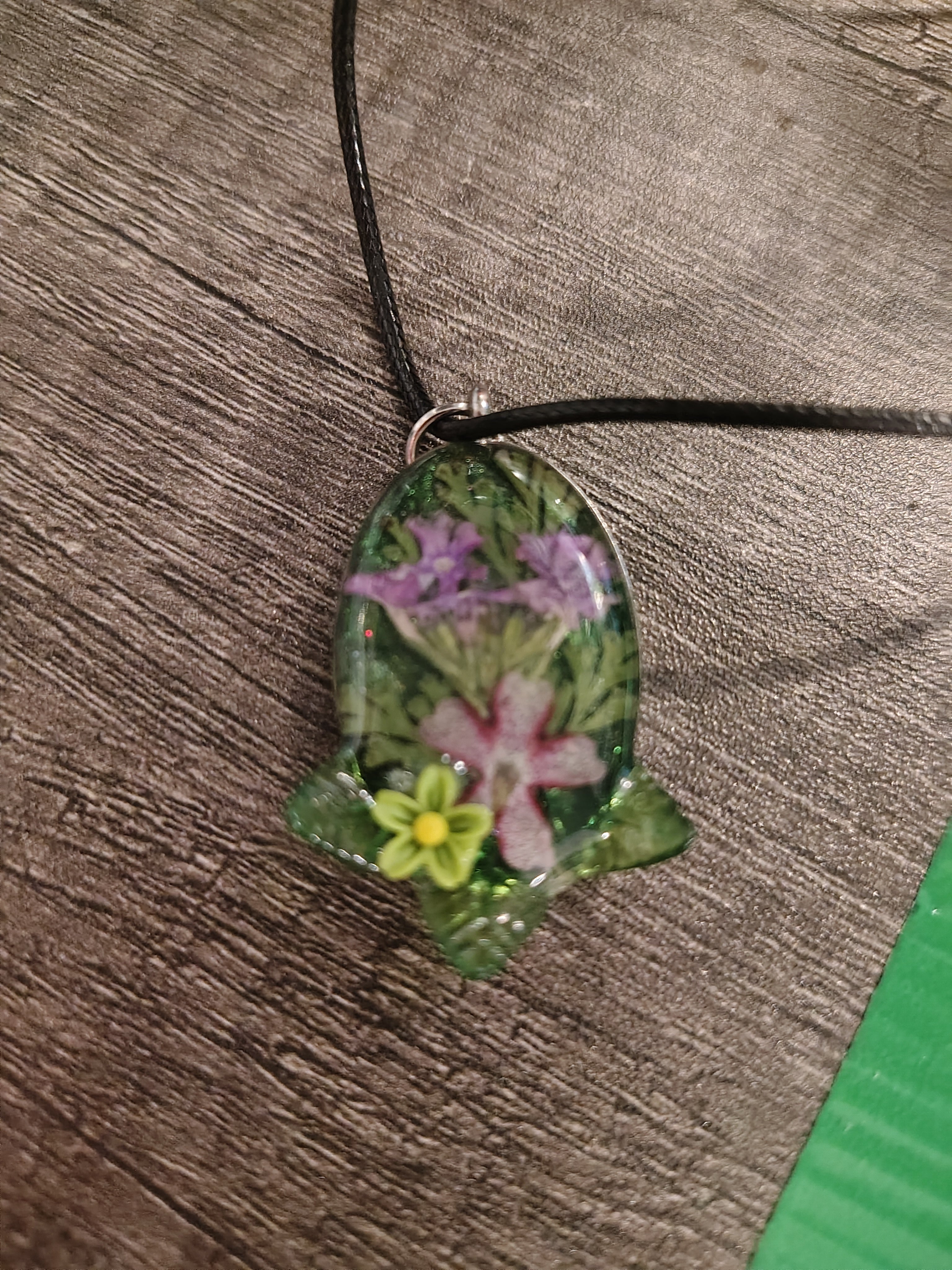 VeilBloom™ Sunflower Garden Pendant — round gold bezel with preserved sunflower, yellow cord