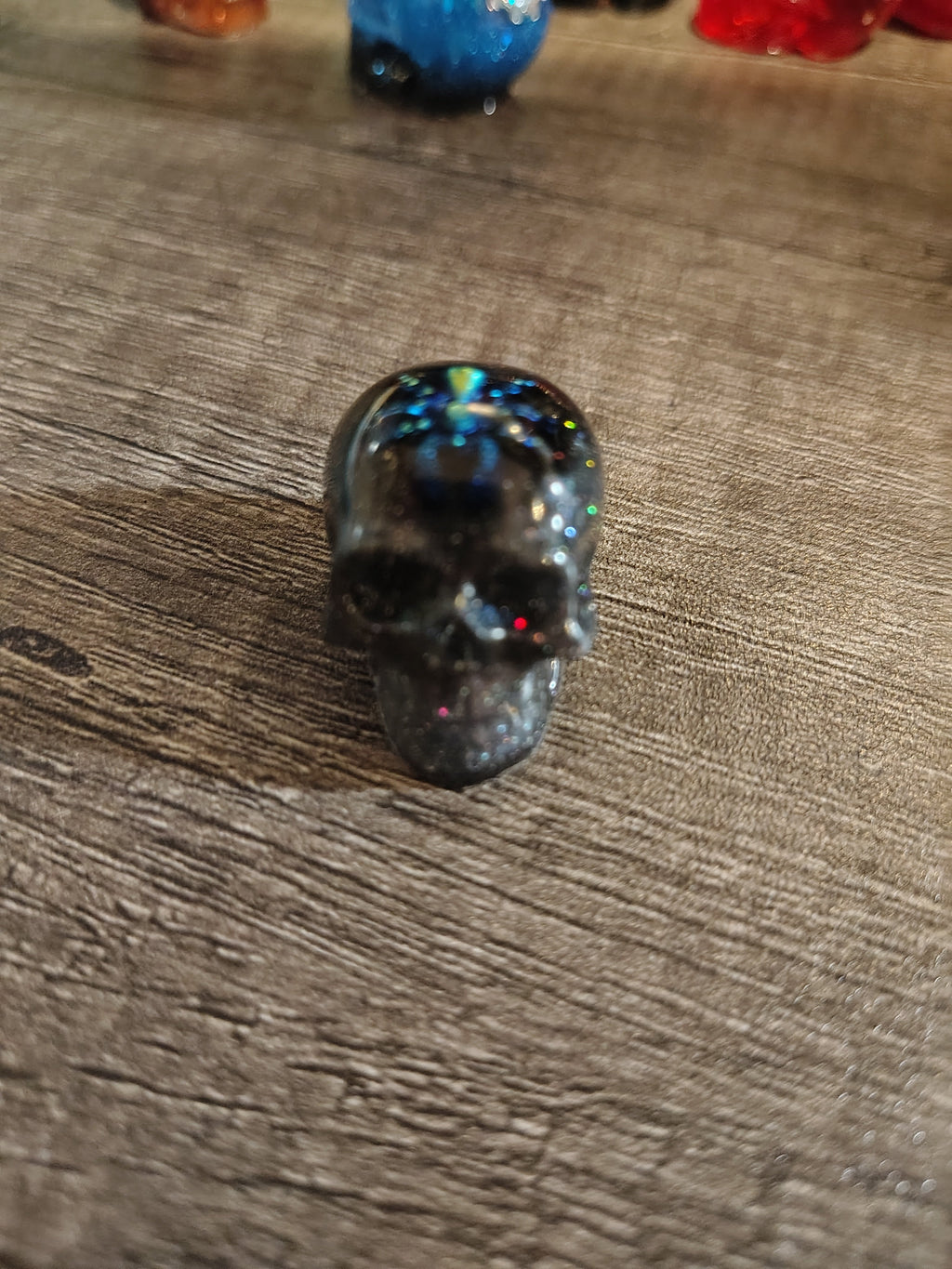 Black iridescent glitter mini skull with spider - full face view