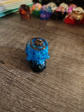 Electric blue steampunk mini skull with bronze gears - side view