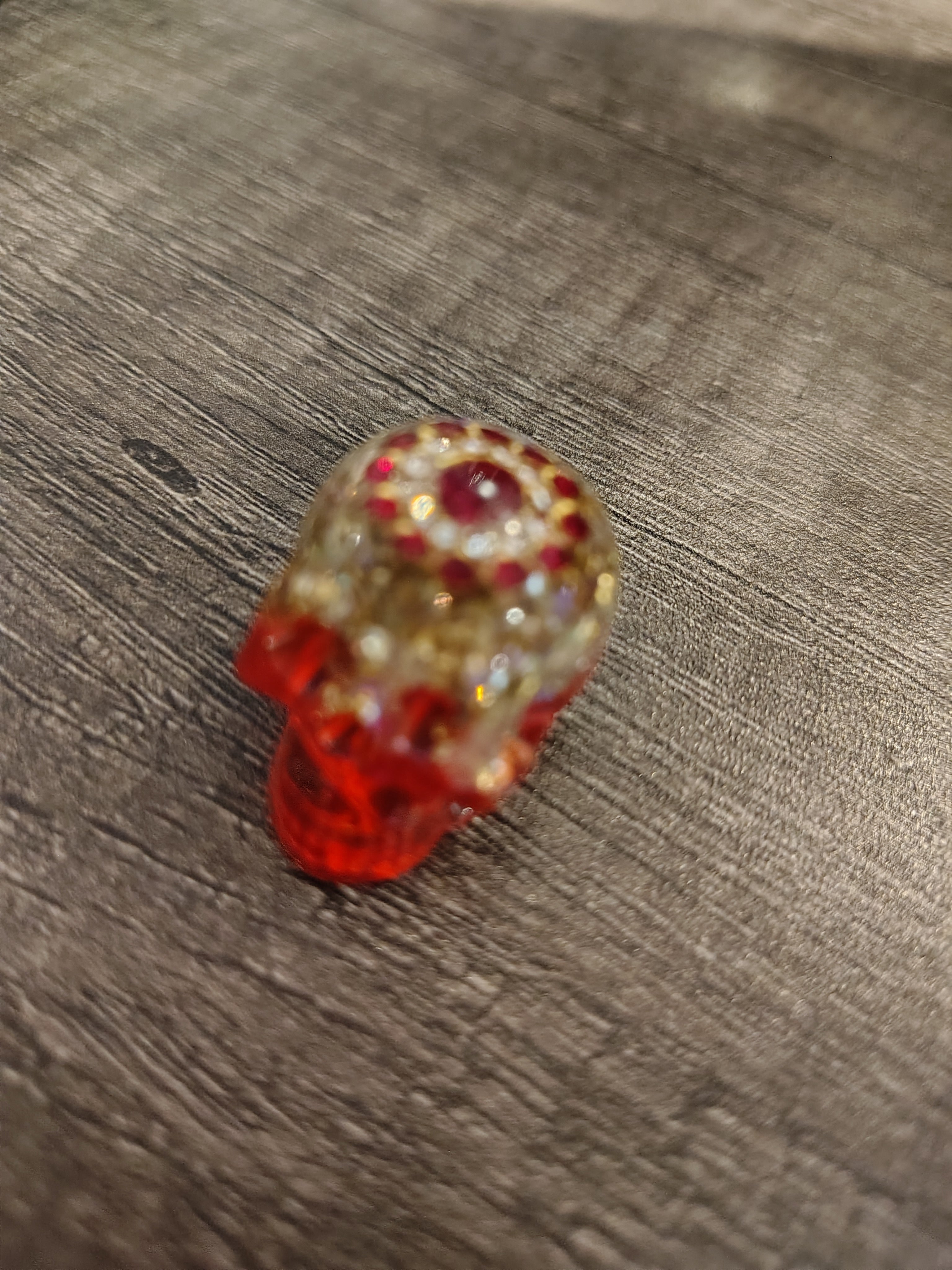 Pink steampunk mini skull with bronze gears - side view