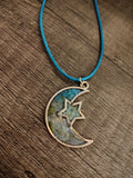 VeilBloom™ — Crescent Moon Botanical Pendant