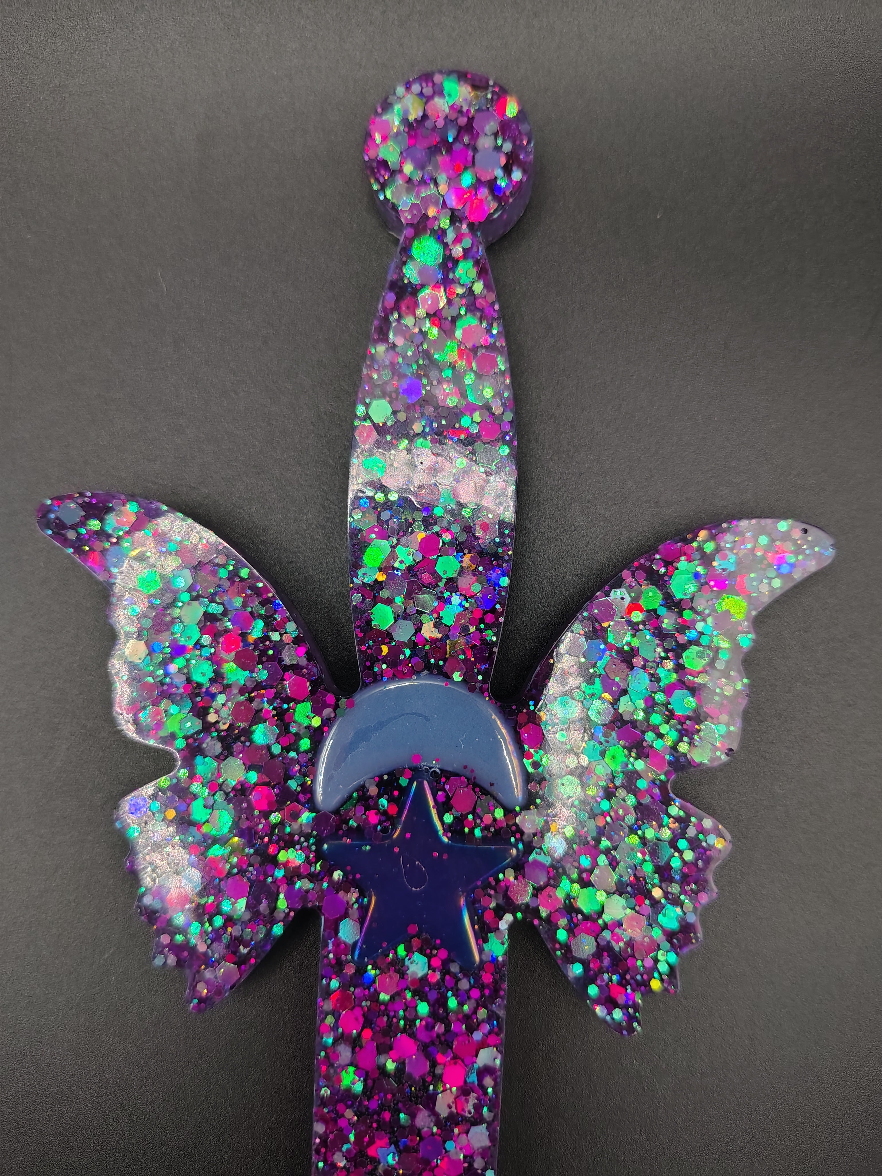 Realm Blades™ - purple holographic butterfly wing sword detail
