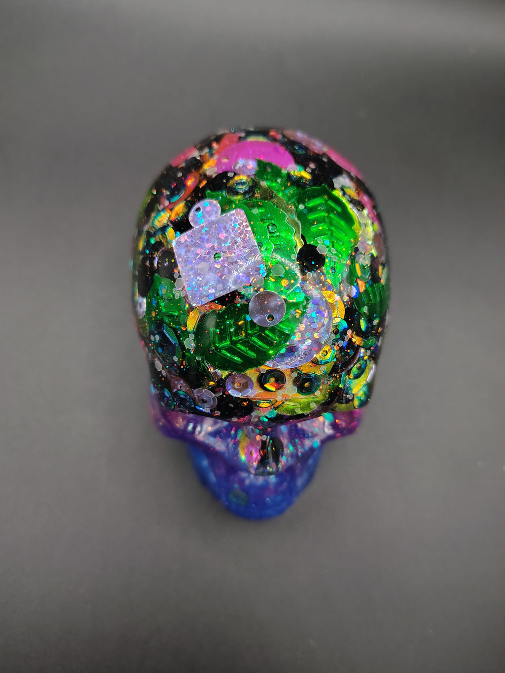 Large sequin skull with puzzle piece and leaf sequins - top down view