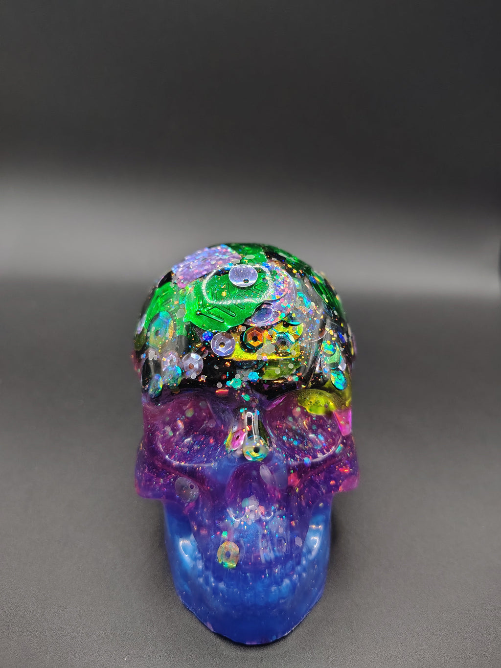 Large sequin storm resin skull - front view showing purple to blue fade