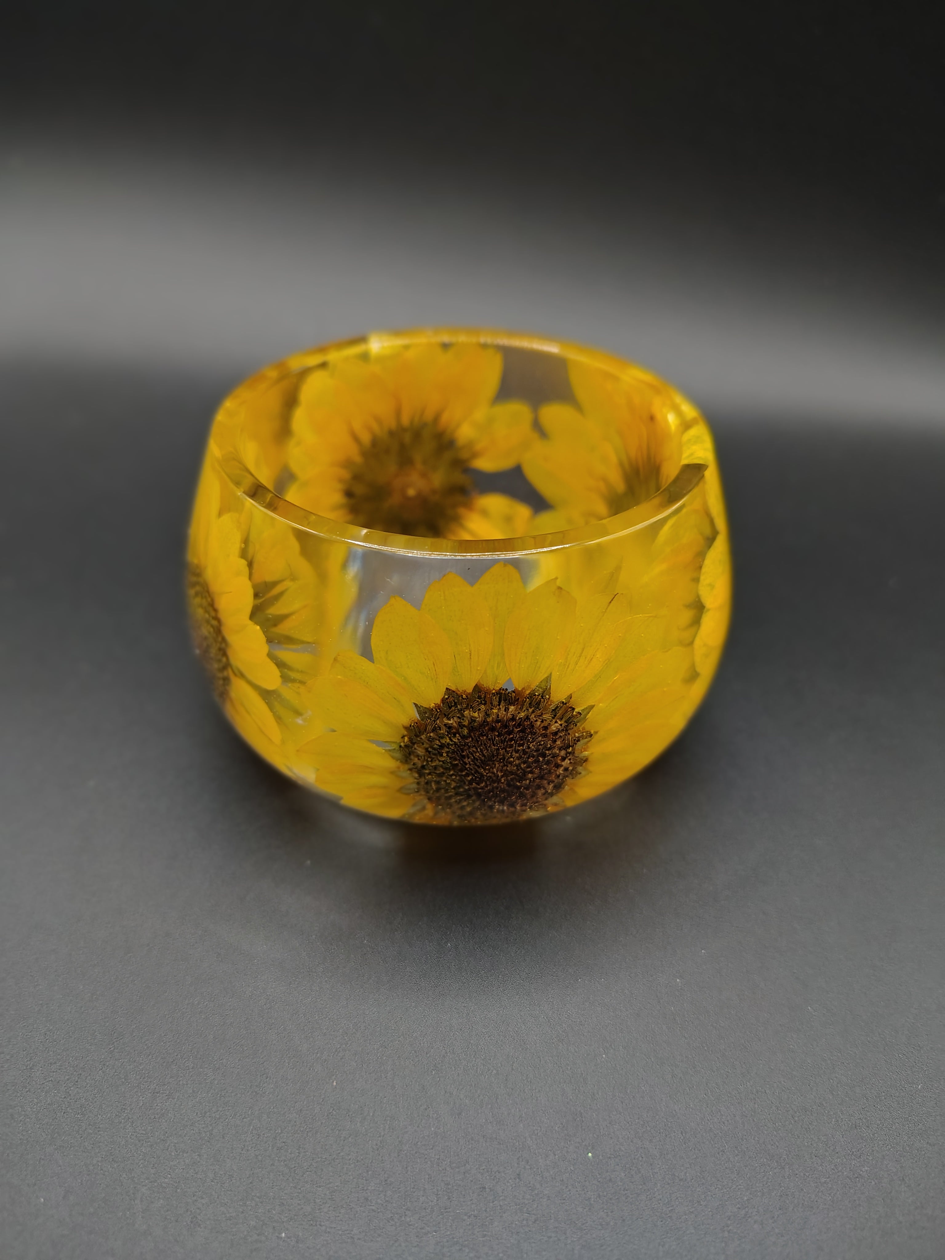 Sunflower Trinket Cup™ - clear resin bowl with pressed sunflowers side view