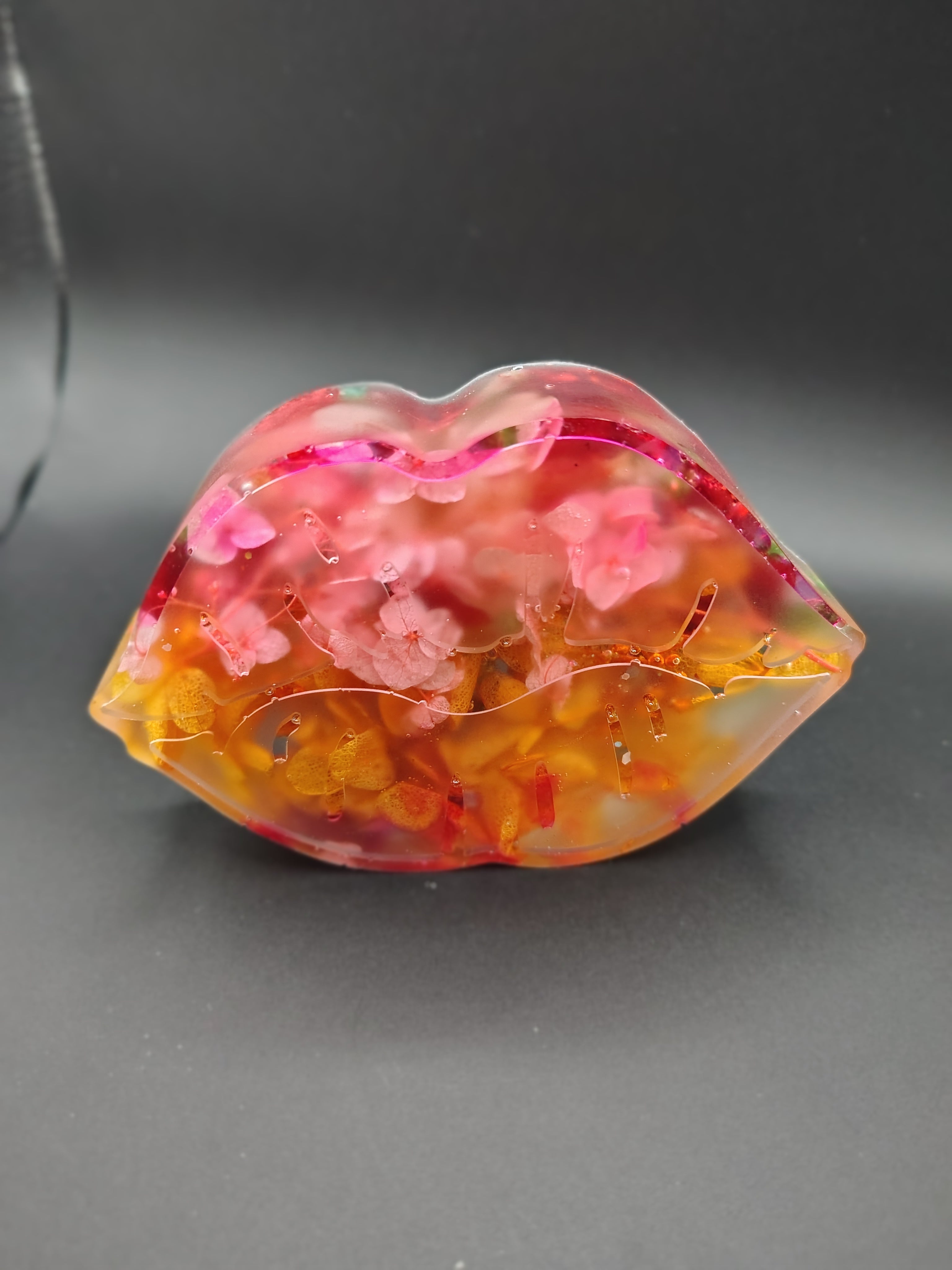 Bloom Kiss™ - floral resin lip paperweight side angle showing flower depth