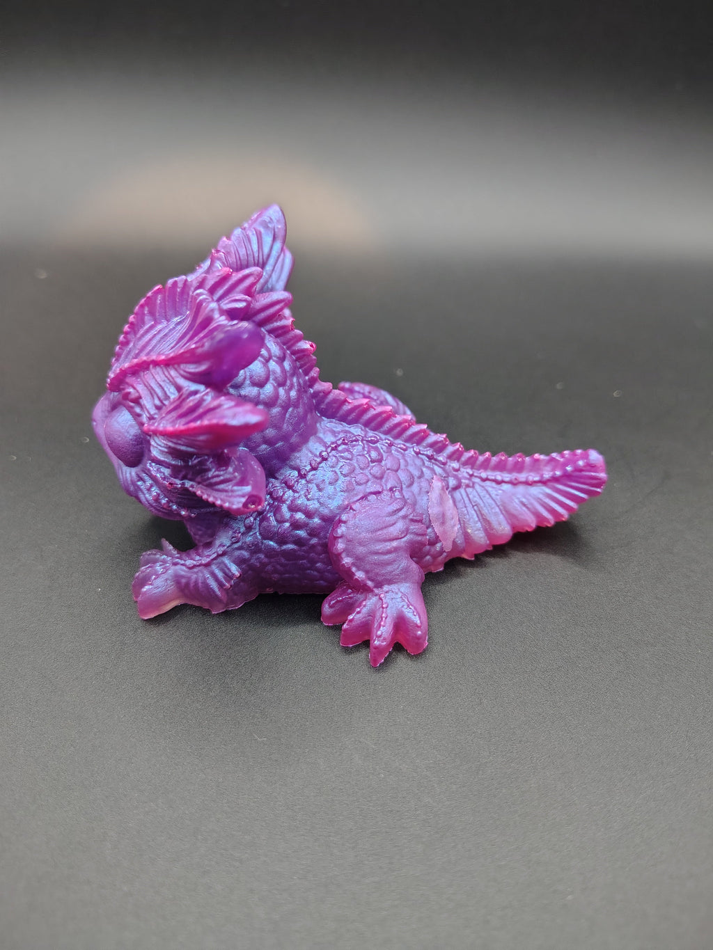 Realm Hatchlings™ - purple magenta baby dragon three quarter view
