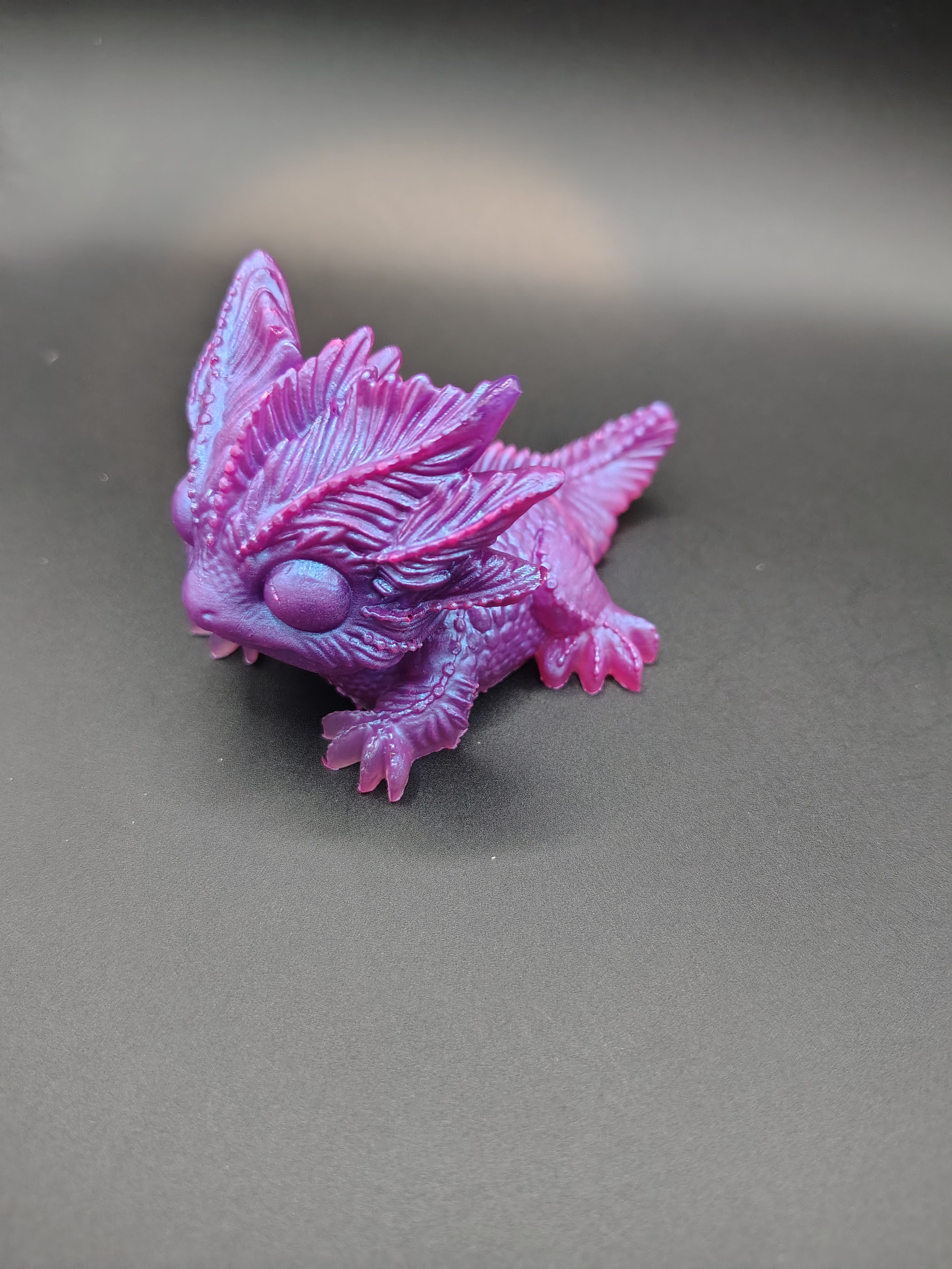 Realm Hatchlings™ - cosmic purple baby dragon looking down